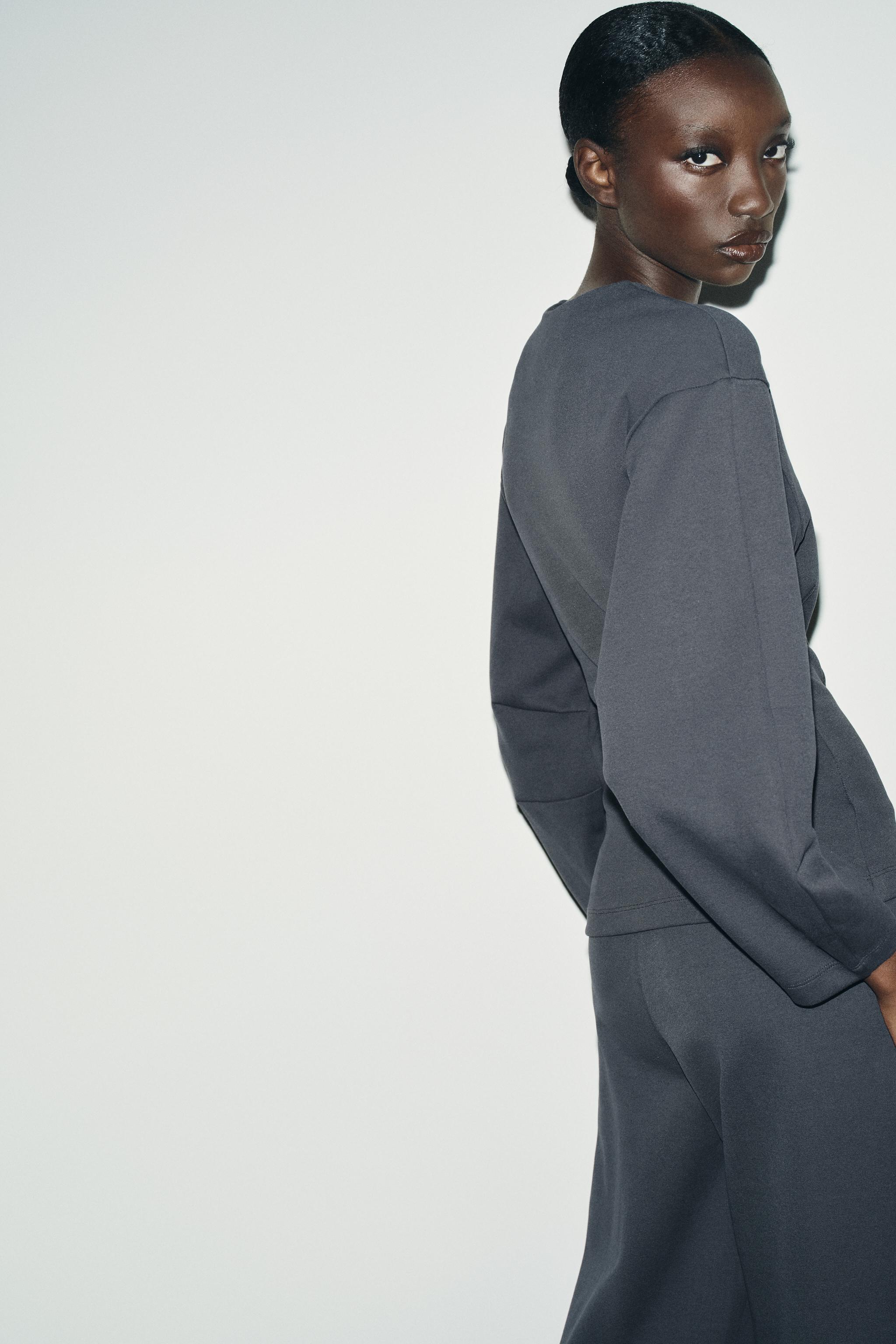 INTERLOCK JUMPER WITH DARTS